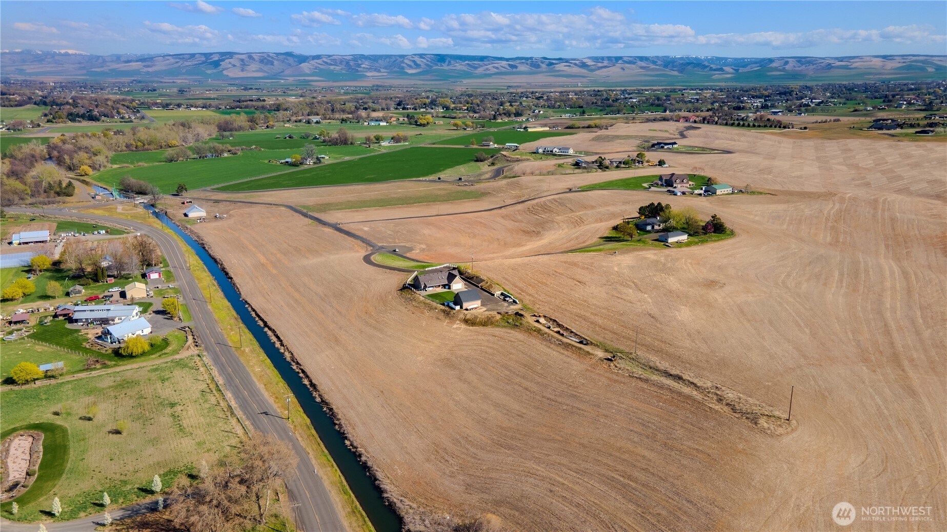 187 Cross Creek Road Walla Walla, WA 99362 - Photo 2 of 22 an aerial view of a house with a garden