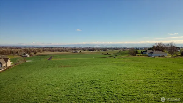 a view of a golf course with space