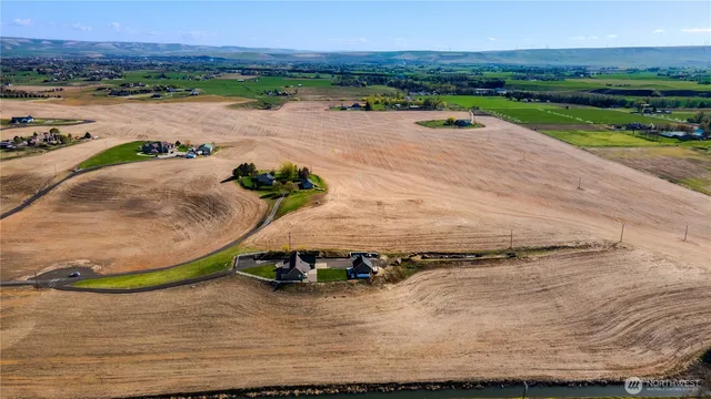 an aerial view of a house with outdoor space