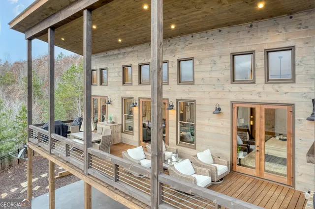 a bathroom with a tub and toilet