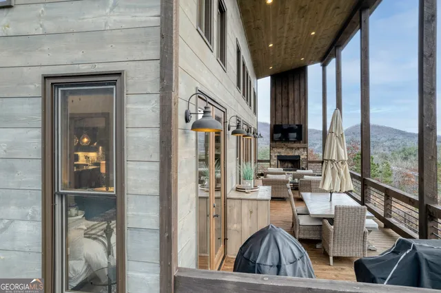 a bathroom with a sink toilet vanity and shower
