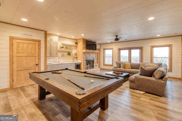 a view of a swimming pool with a patio