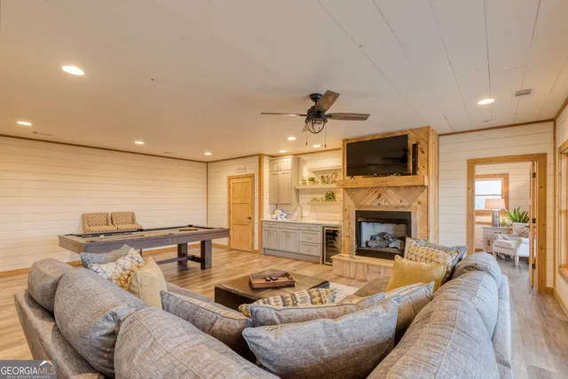 a room with balcony stairs and furniture
