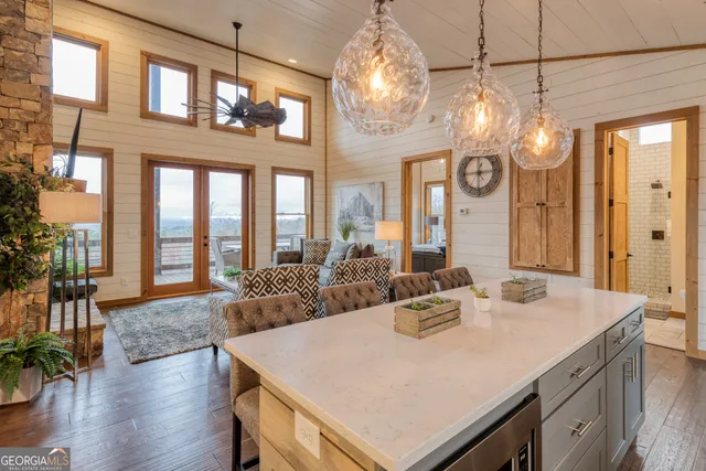 a bedroom with furniture and a mirror