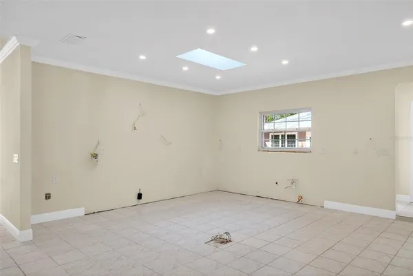 a view of a hallway with closet and door
