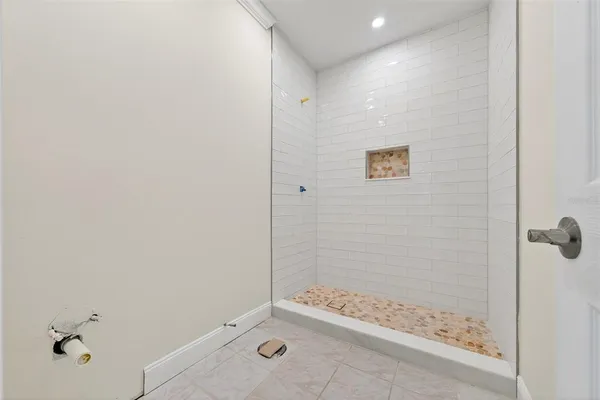 a bathroom with a double vanity sink mirror and