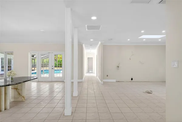 a bathroom with a double vanity sink and mirror