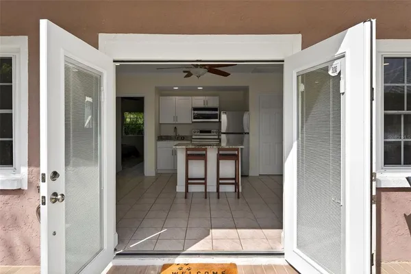 a view of a lake in middle of forest