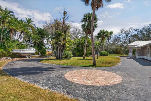 $4,419,000 | 7108 Midnight Pass Road, Sarasota, FL 34242