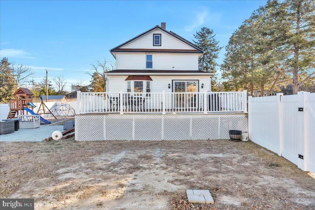 a view of a house with a street