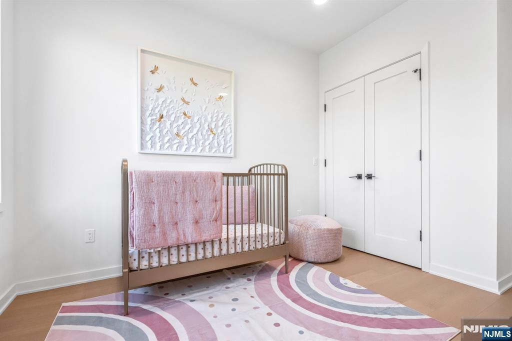 5 Fey Place Oradell, NJ 07649 - Photo 22 of 30 a view of a room with wooden floor and furniture