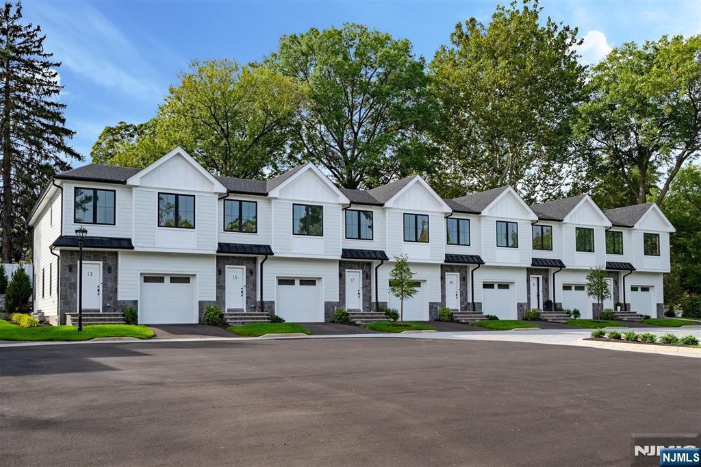 5 Fey Place Oradell, NJ 07649 - Photo 30 of 30 a front view of a large white house