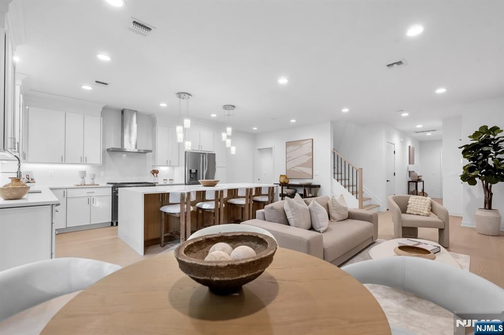 5 Fey Place Oradell, NJ 07649 - Photo 3 of 30 a living room with furniture and a view of kitchen