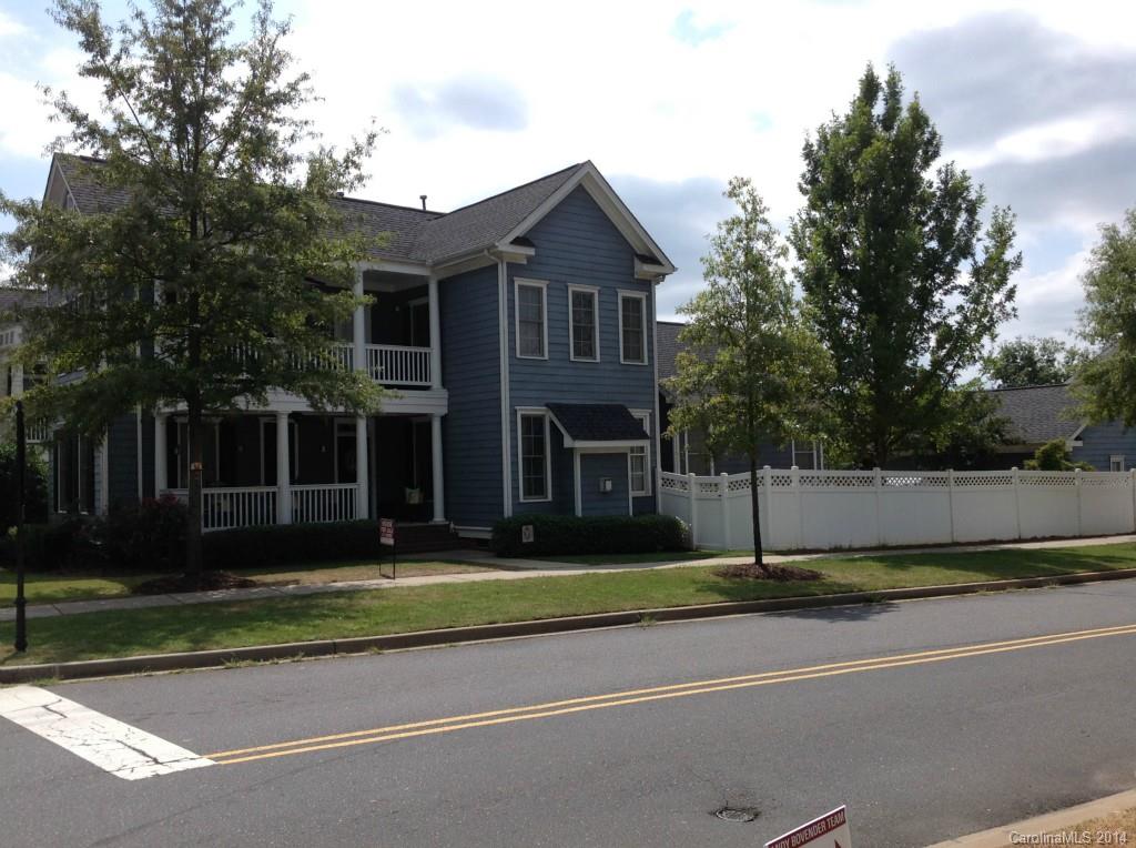 1195 Springmaid Avenue Fort Mill, SC 29708 - Photo 1 of 22 a front view of a house with a yard