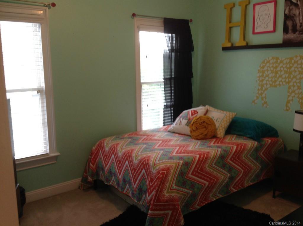 1195 Springmaid Avenue Fort Mill, SC 29708 - Photo 12 of 22 a bedroom with a bed and a window