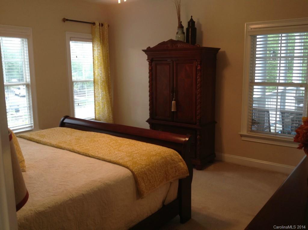 1195 Springmaid Avenue Fort Mill, SC 29708 - Photo 14 of 22 a bedroom with a bed and a window