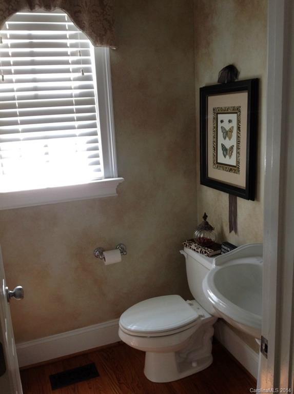 1195 Springmaid Avenue Fort Mill, SC 29708 - Photo 22 of 22 a bathroom with a toilet a sink and a window