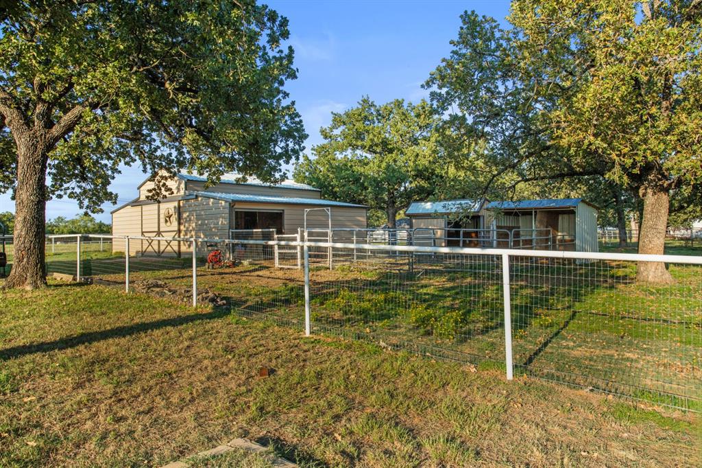 175 Porter Road Bartonville, TX 76226 - Photo 5 of 40 front view of a house with a yard