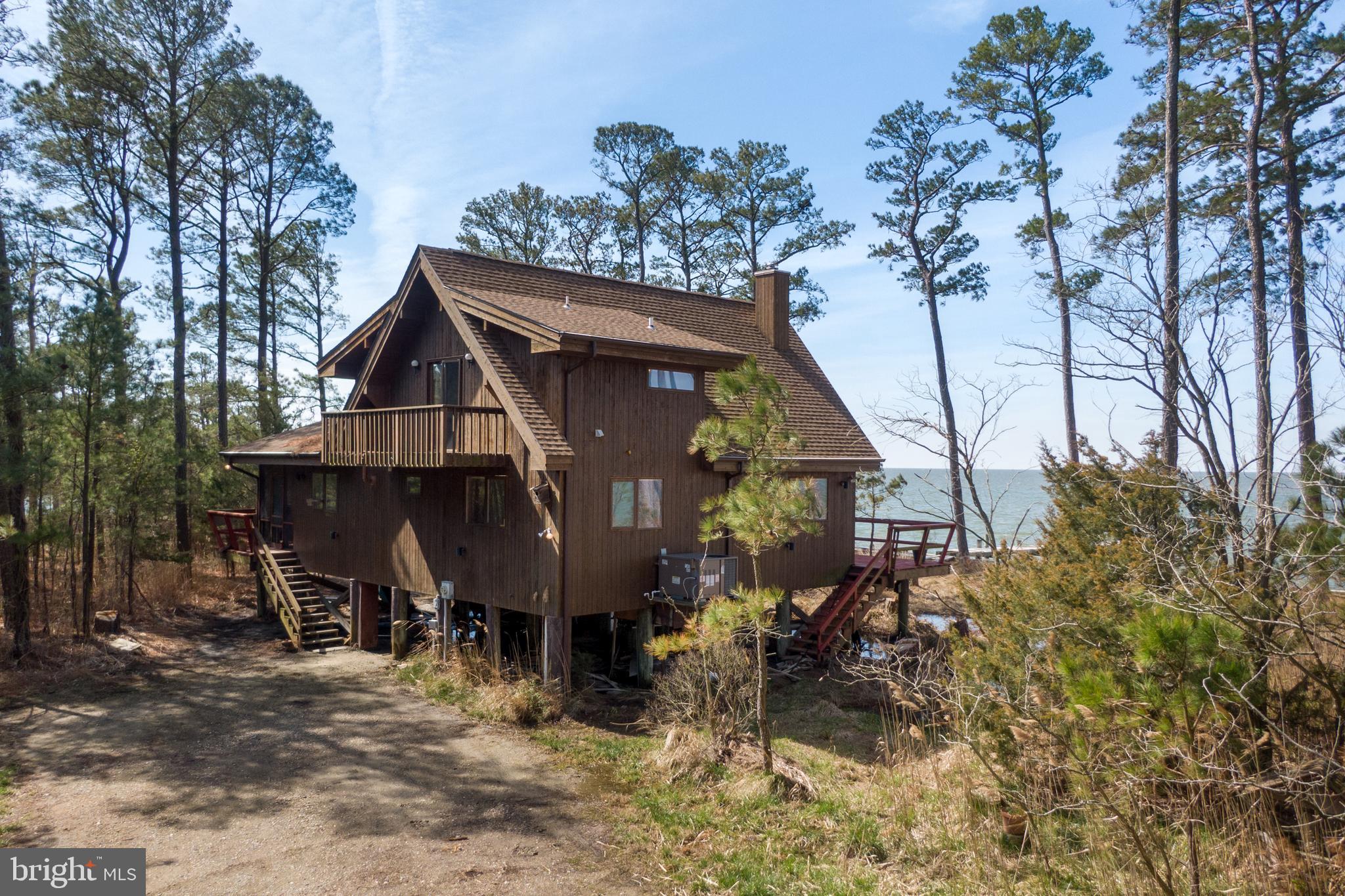 a view of house with outdoor seating