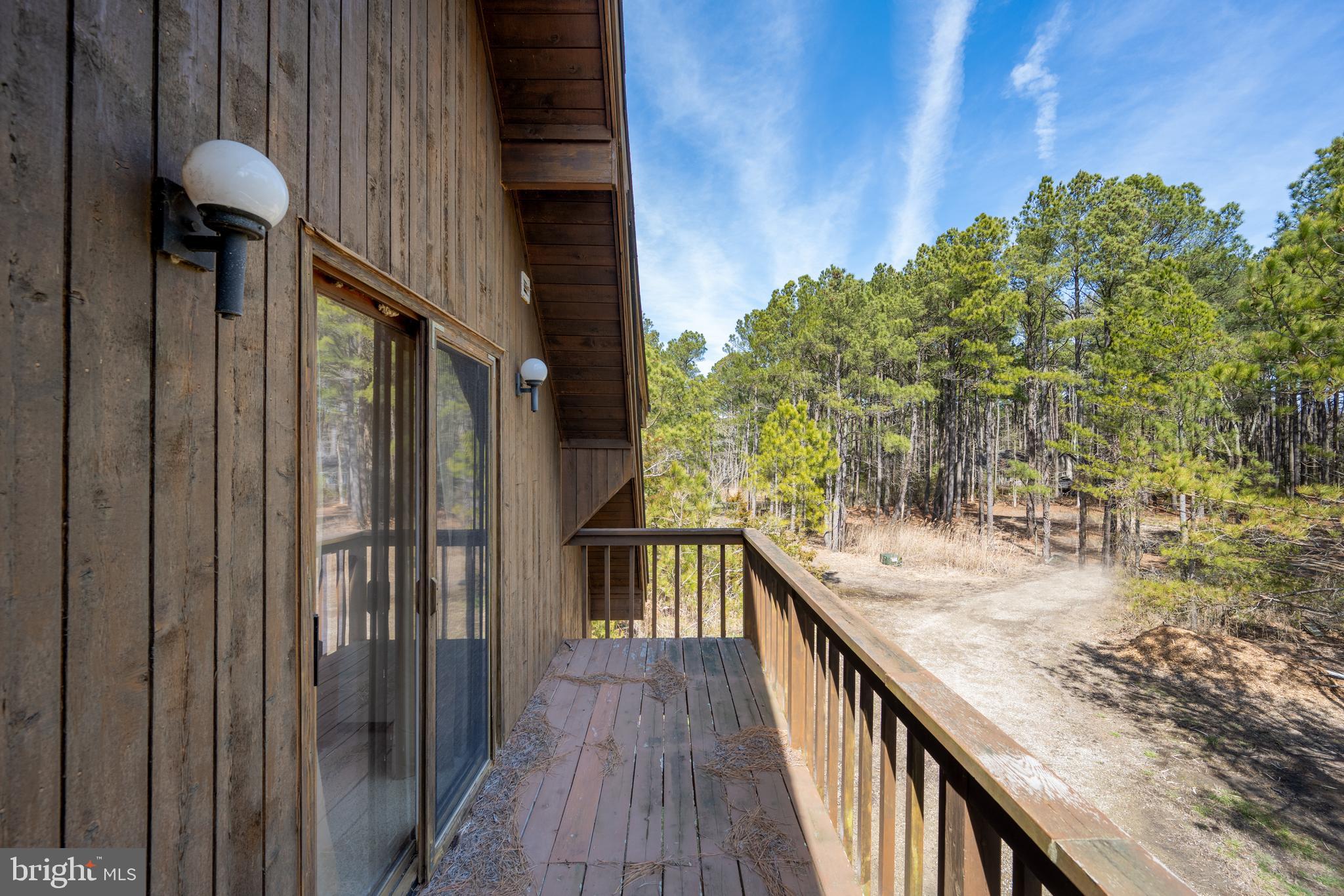 20174 Nanticoke Road Nanticoke, MD 21840 - Photo 34 of 48 a balcony with view of outdoor space
