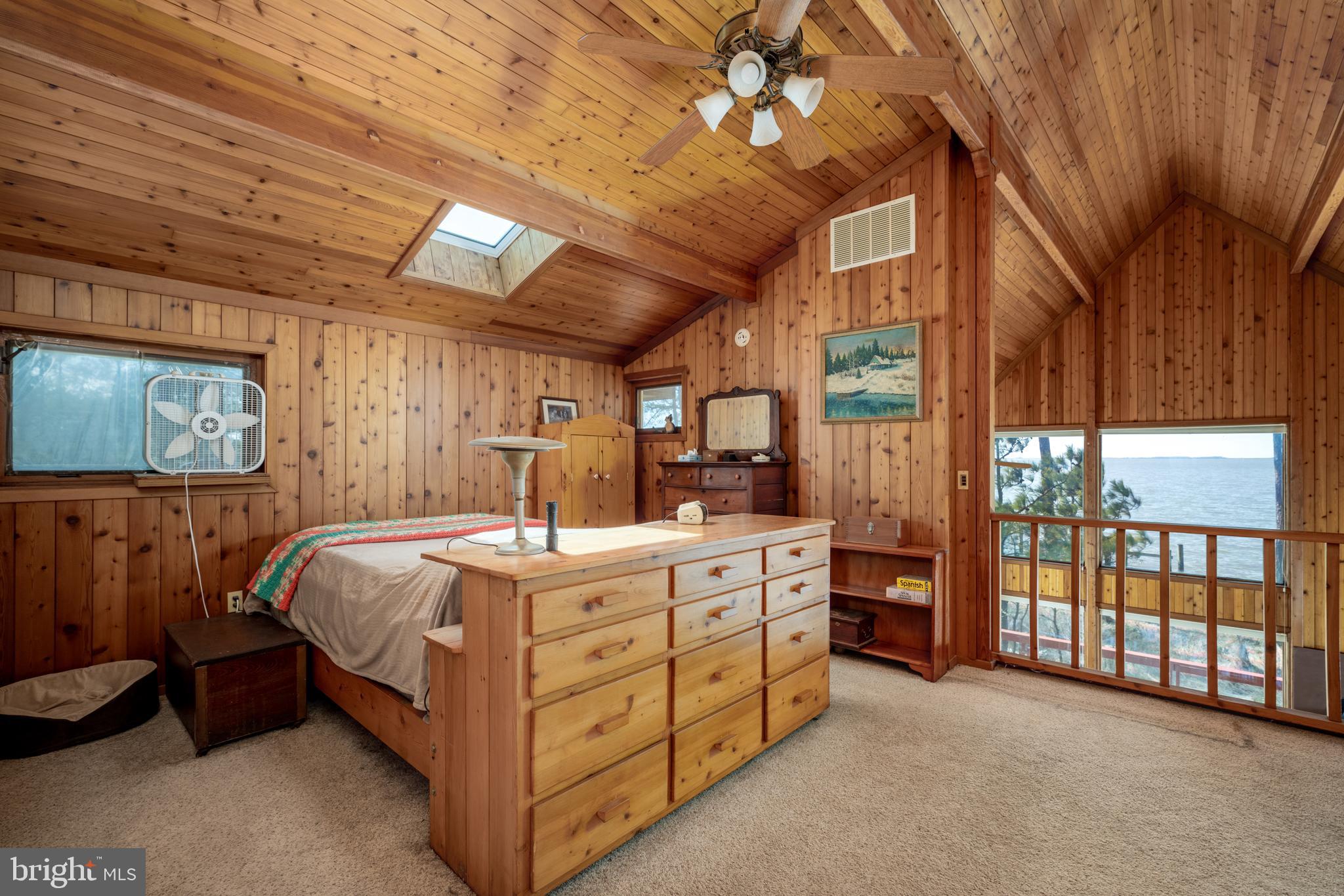 20174 Nanticoke Road Nanticoke, MD 21840 - Photo 4 of 48 a bed room with a bed and a dresser
