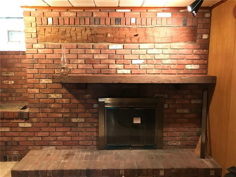 751 Saxonburg Road Butler, PA 16002 - Photo 15 of 21 Basement fireplace
