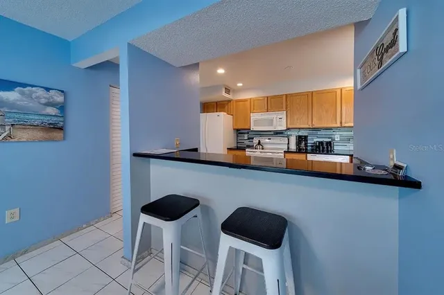 $5,000 | 6157 Midnight Pass Road, Unit D32, Sarasota, FL 34242