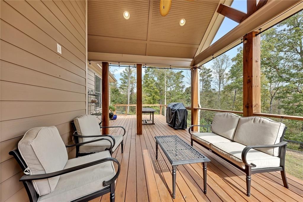 801 Town Creek Church Road Talking Rock, GA 30175 - Photo 26 of 58 a living room with furniture and a large window