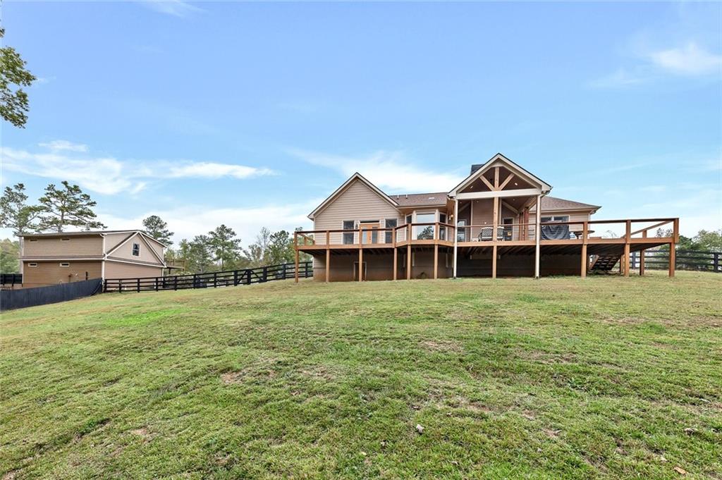 801 Town Creek Church Road Talking Rock, GA 30175 - Photo 43 of 58 a front view of a house with a garden