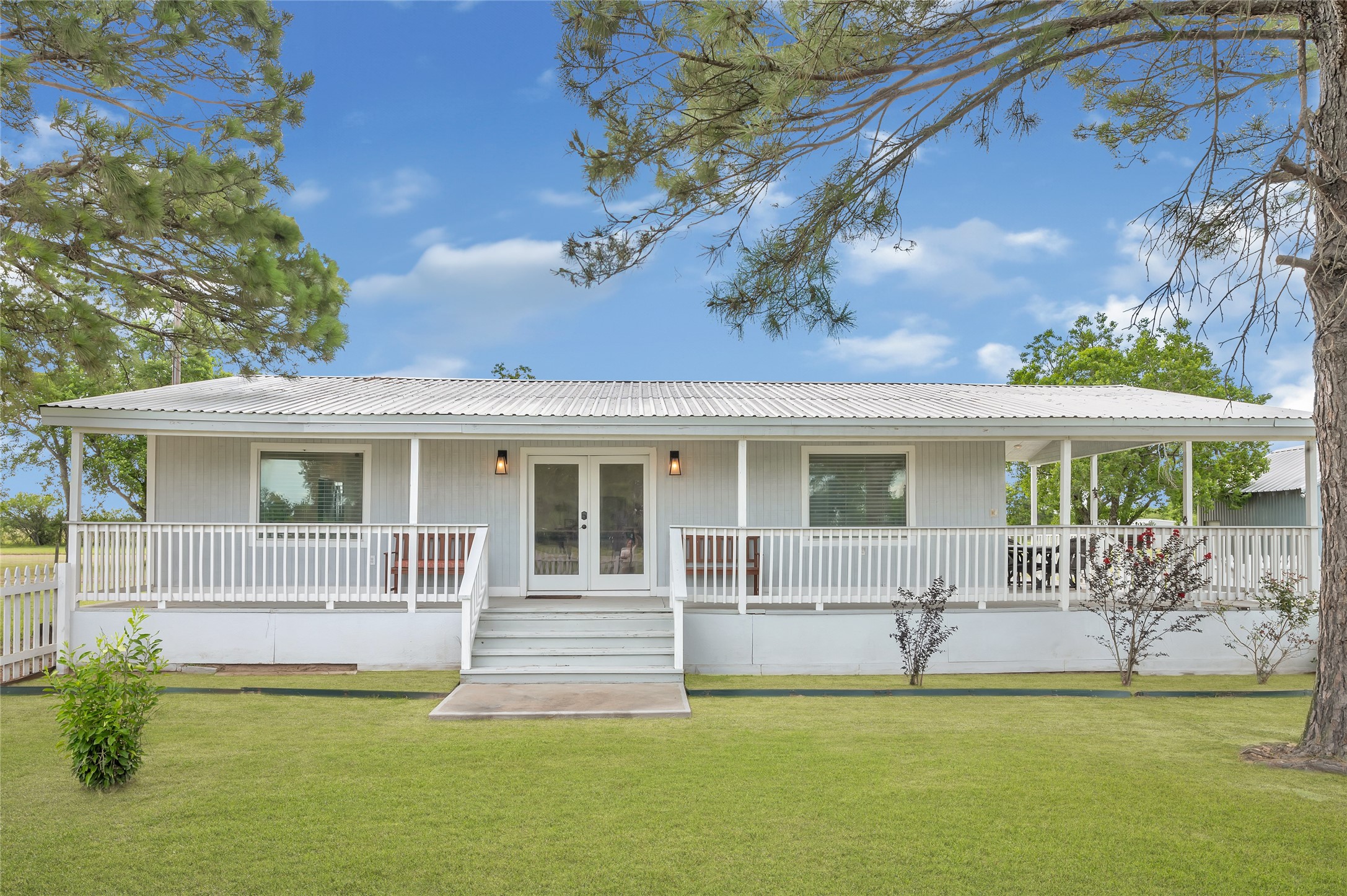 868 Lisa May Road Bellville, TX 77418 - Photo 4 of 39 A beautifully maintained cabin that offers a peaceful sanctuary amid the vast acreage.