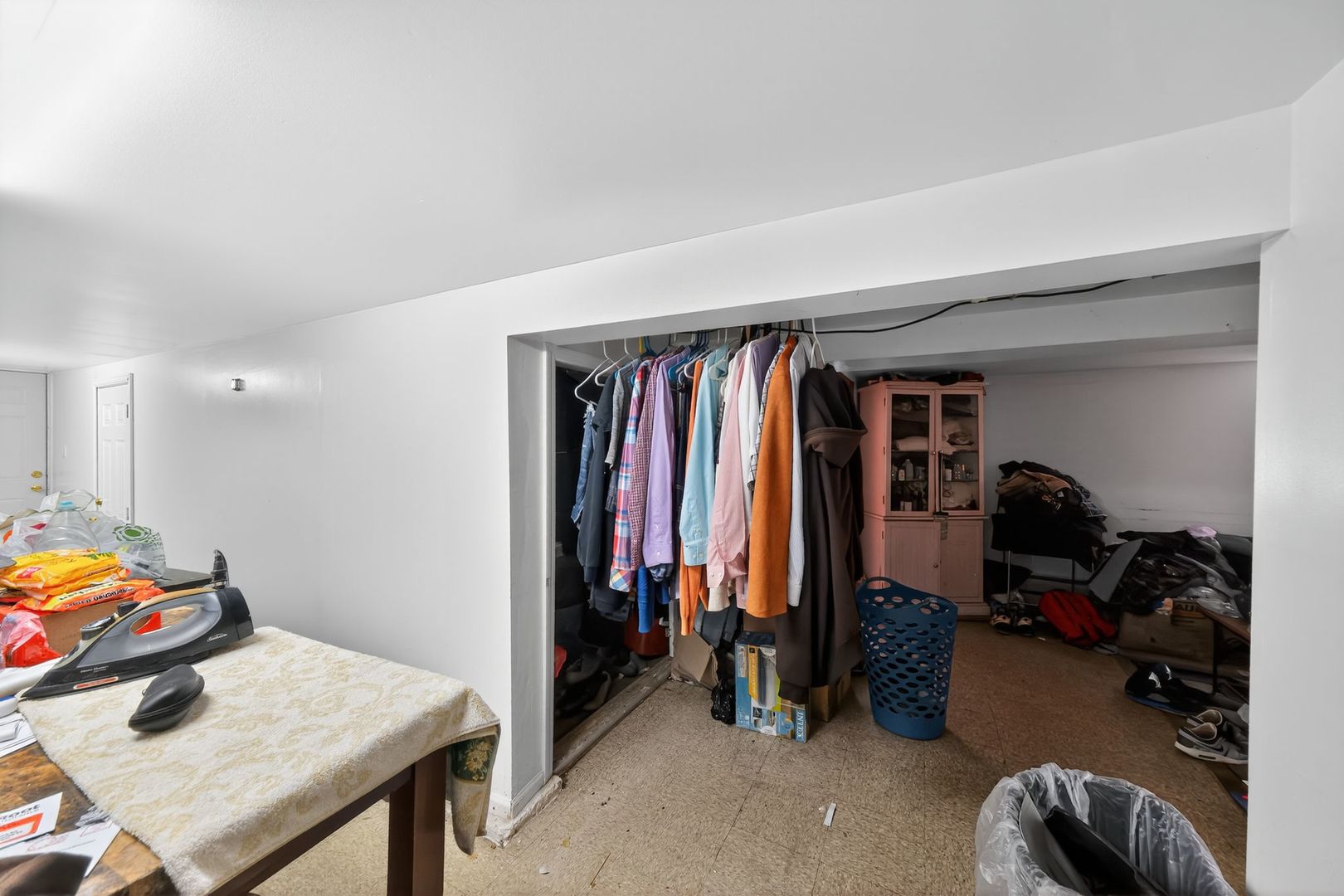 6541 South Carpenter Street Chicago, IL 60621 - Photo 19 of 27 a view of a livingroom with furniture and closet