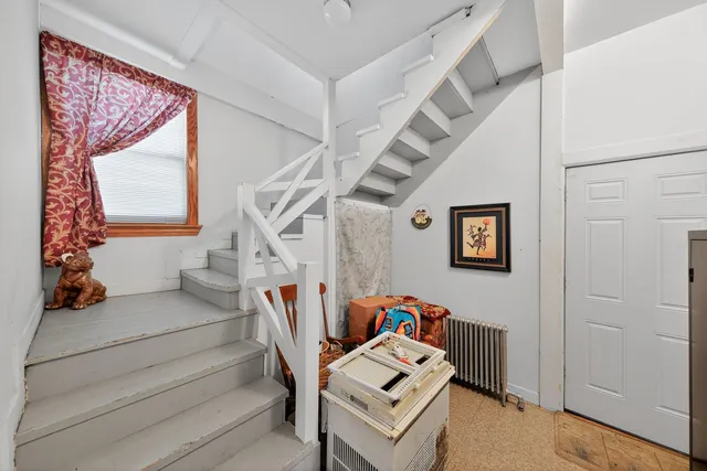 a view of stairs with wooden floor