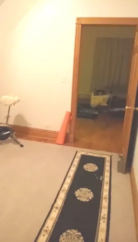 a view of balcony with furniture