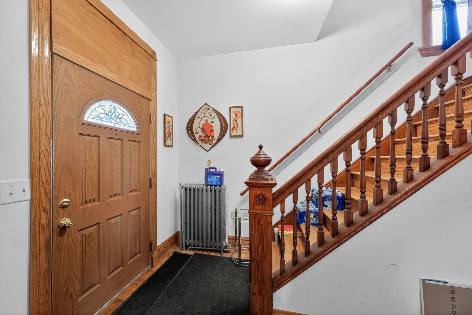 6541 South Carpenter Street Chicago, IL 60621 - Photo 9 of 27 a view of an entryway with wooden floor