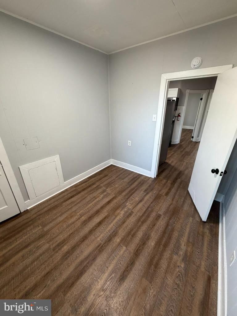 1410 Huddell Avenue Marcus Hook, PA 19061 - Photo 13 of 29 a view of a hallway with wooden floor