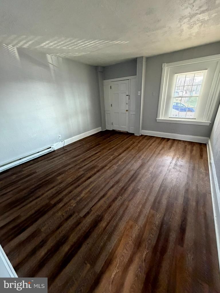1410 Huddell Avenue Marcus Hook, PA 19061 - Photo 4 of 29 wooden floor in an empty room