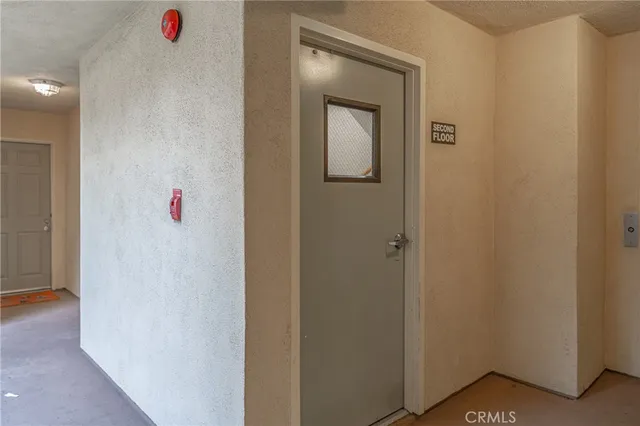 a front view of a building with garden