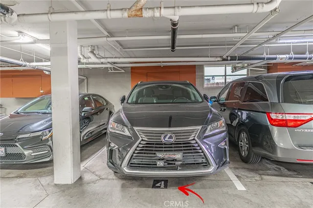 a view of a livingroom with furniture and a potted plant
