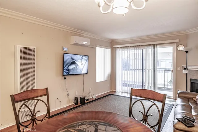 a bedroom with a bed and chair