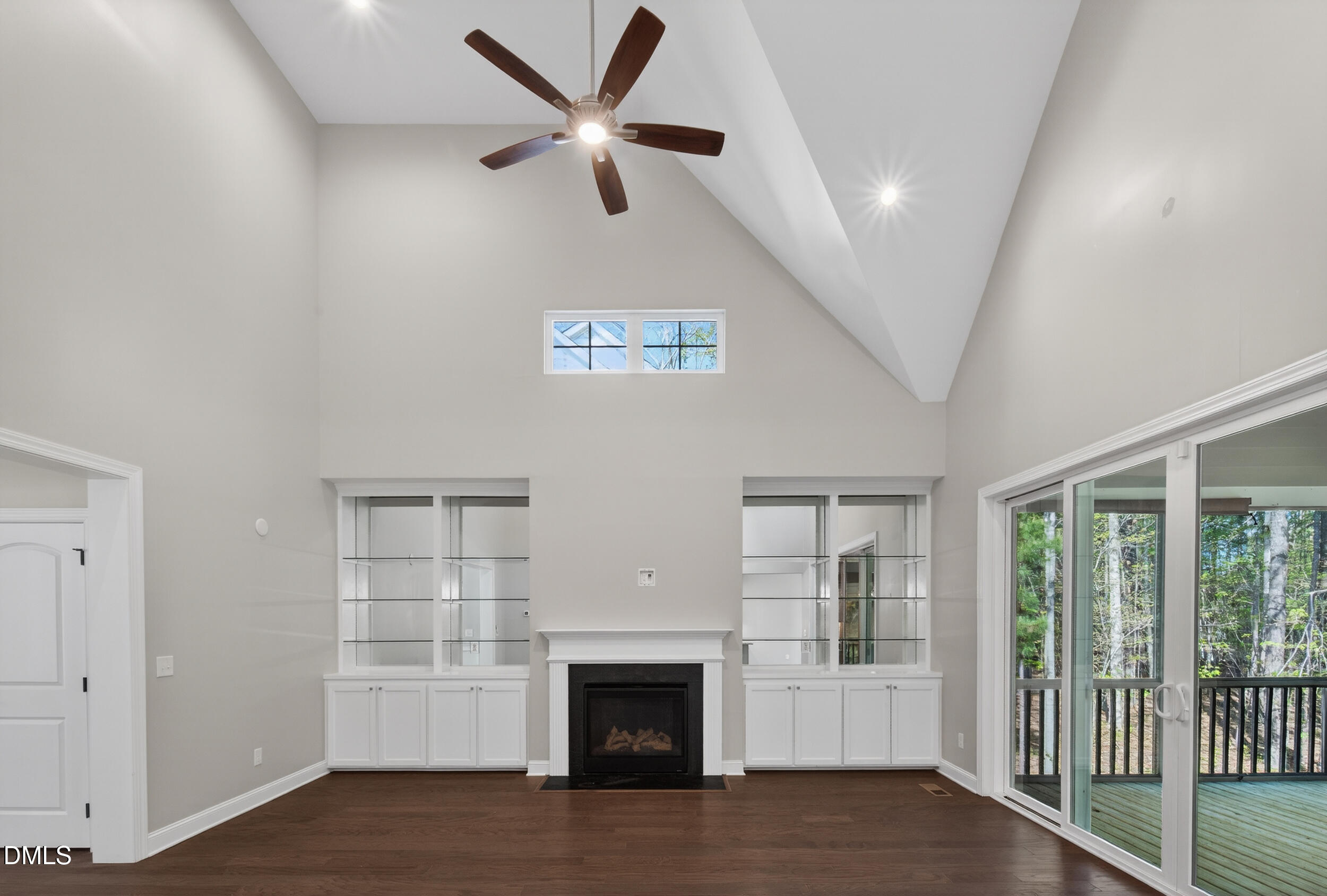 231 High Ridge Lane Pittsboro, NC 27312 - Photo 16 of 47 wooden floor in an empty room with a fireplace