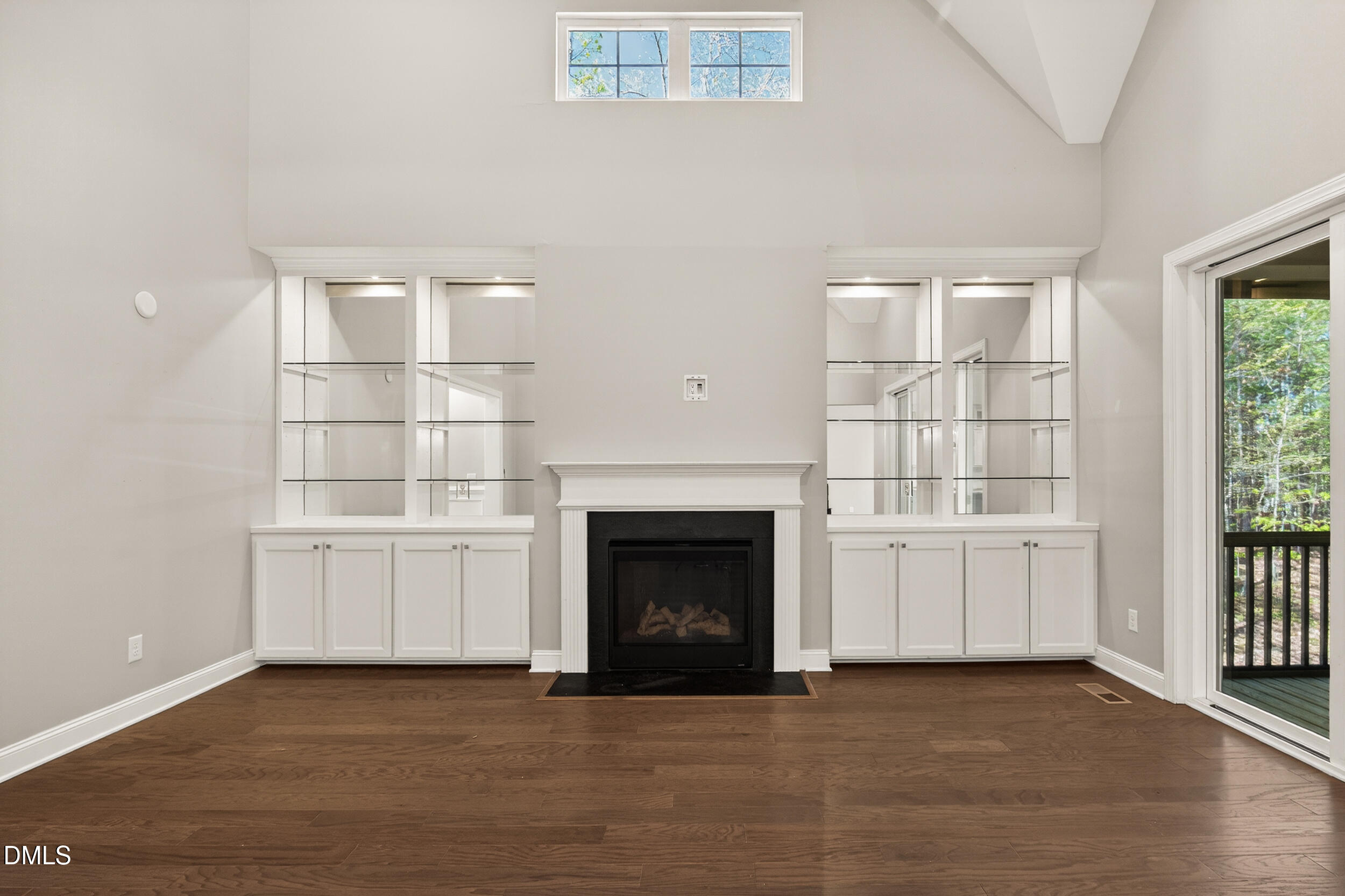 231 High Ridge Lane Pittsboro, NC 27312 - Photo 17 of 47 a view of a livingroom with an empty space and a fireplace