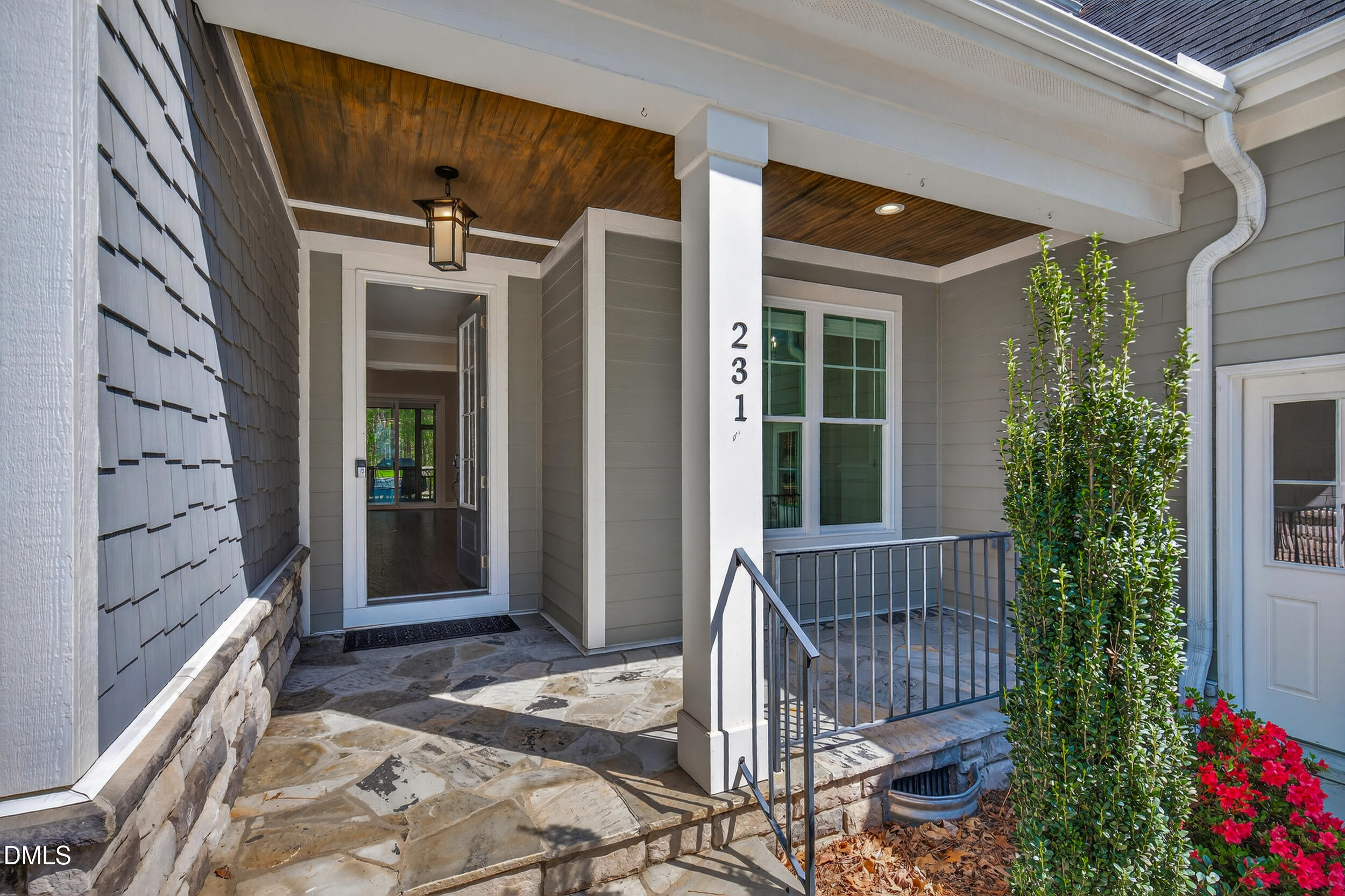 231 High Ridge Lane Pittsboro, NC 27312 - Photo 2 of 47 a front view of a house with a porch