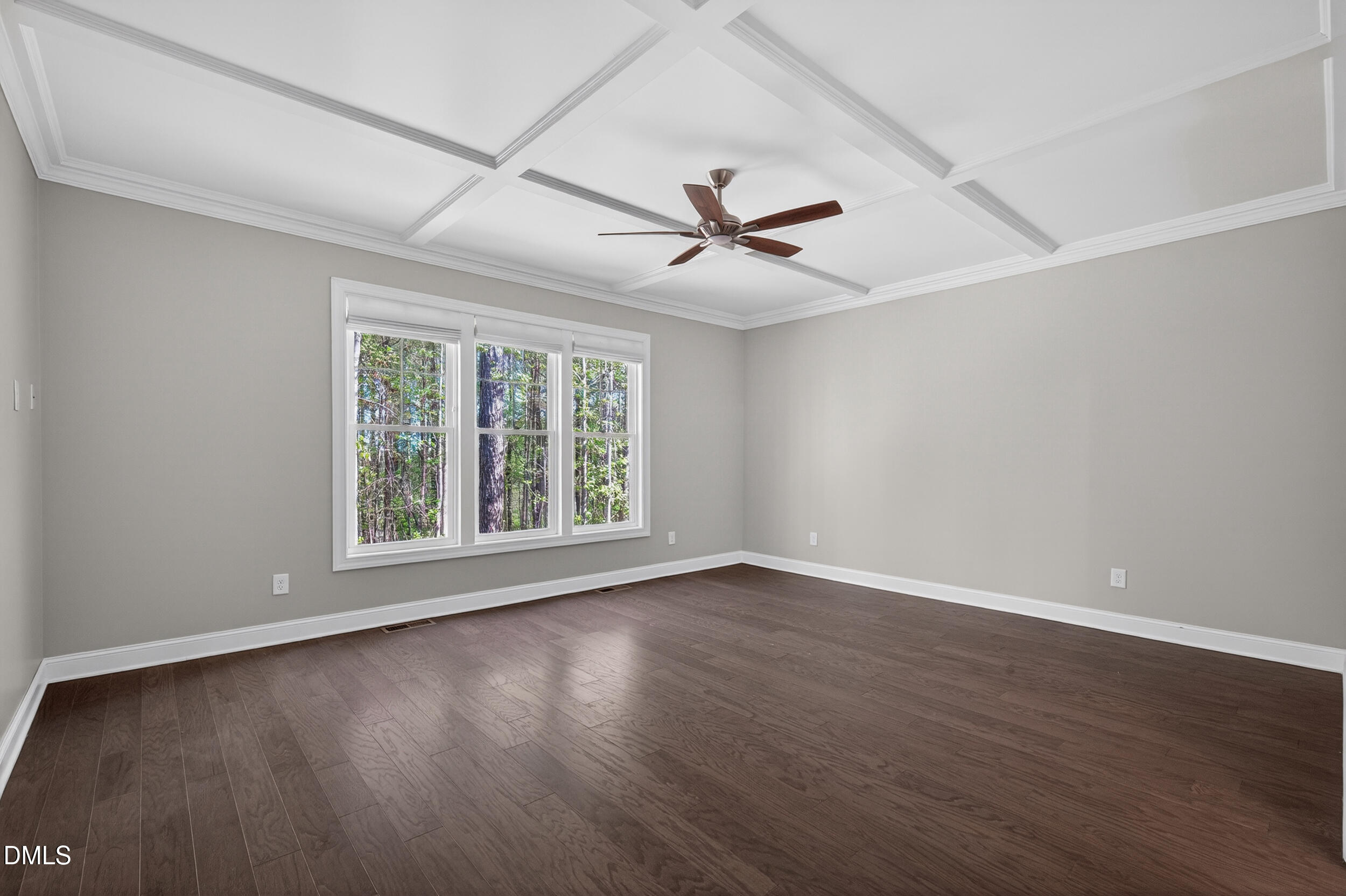 231 High Ridge Lane Pittsboro, NC 27312 - Photo 22 of 47 a view of an empty room with wooden floor and a window