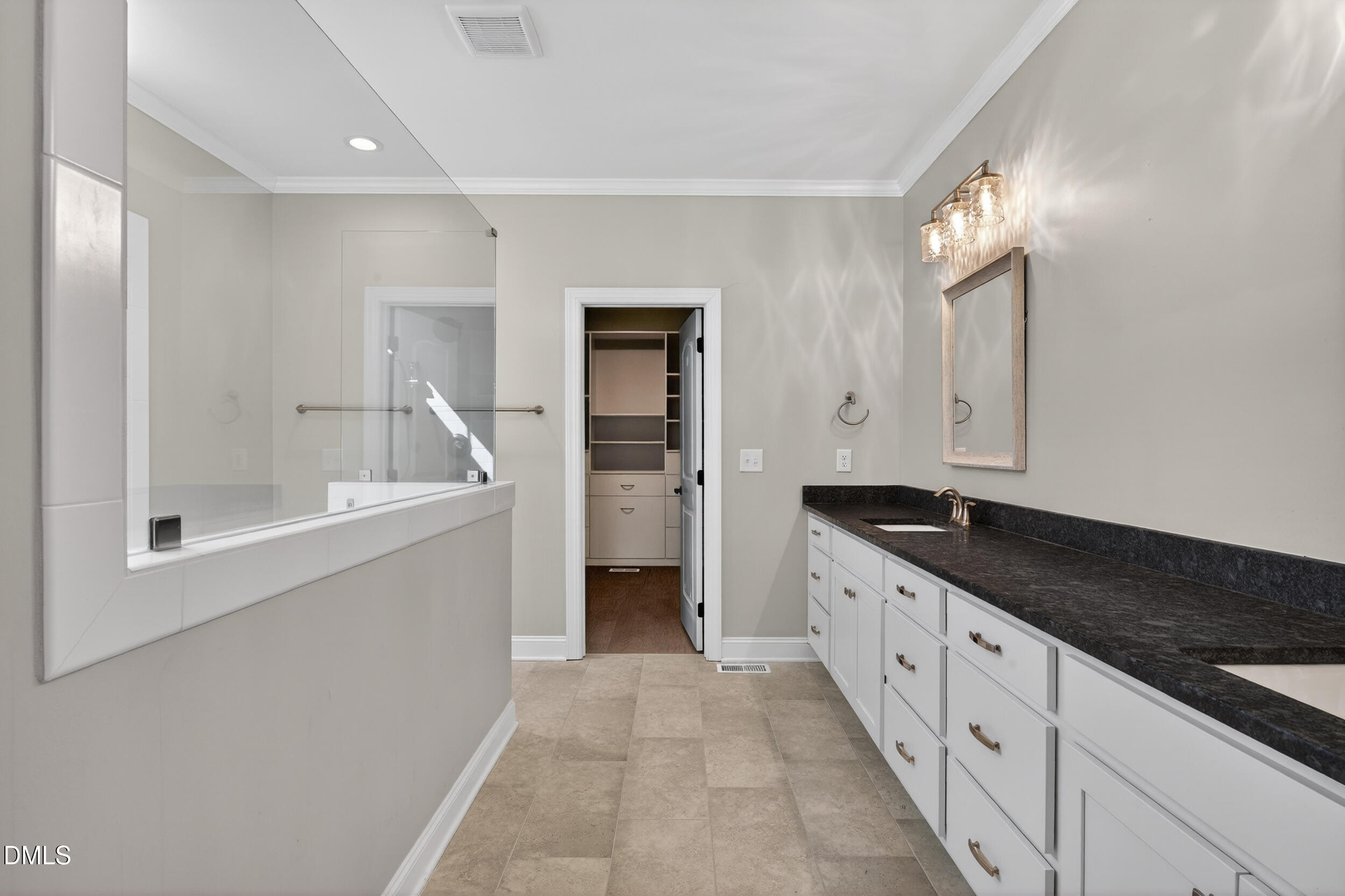 231 High Ridge Lane Pittsboro, NC 27312 - Photo 24 of 47 a large bathroom with a granite countertop sink and a mirror