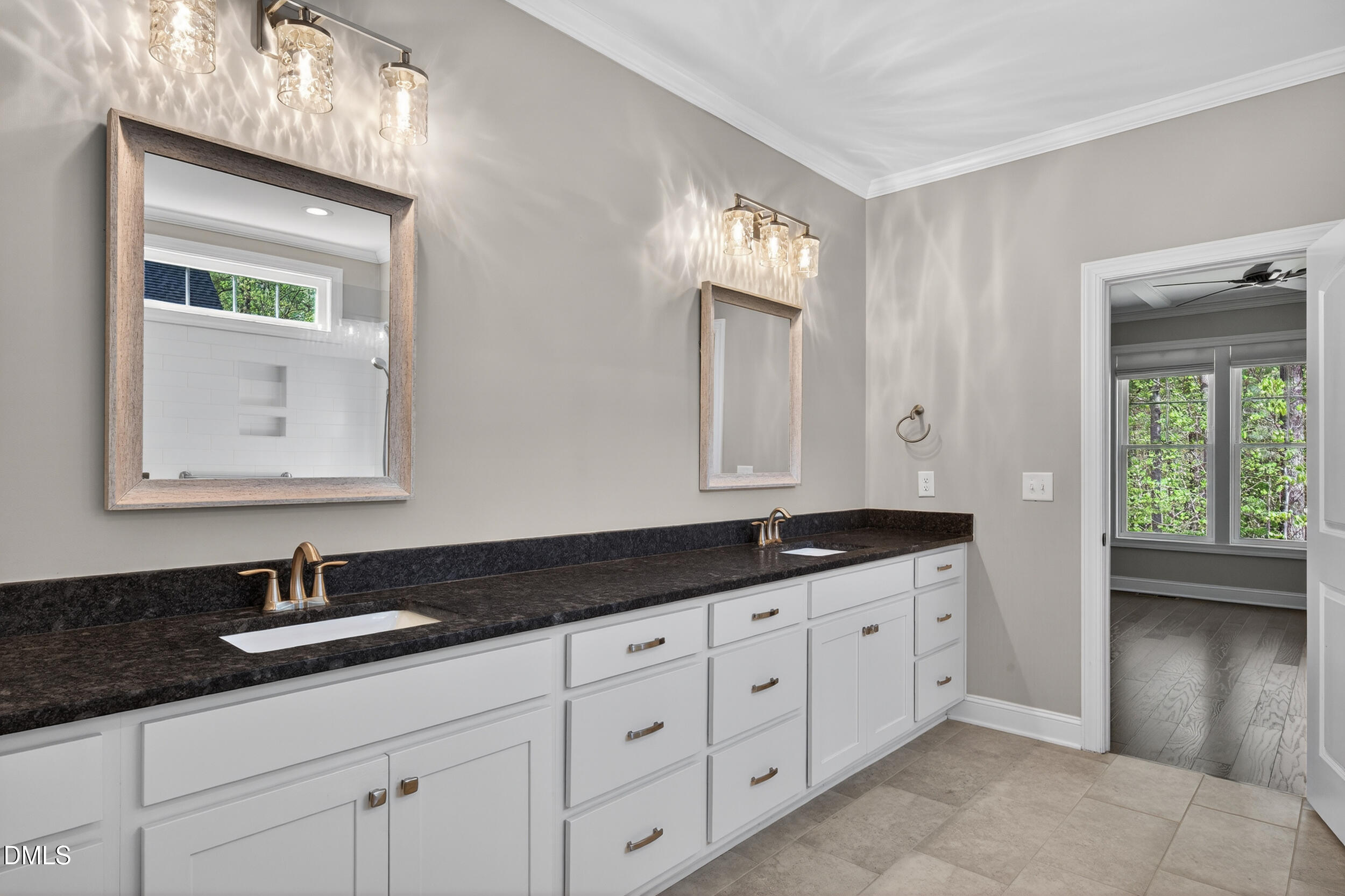231 High Ridge Lane Pittsboro, NC 27312 - Photo 25 of 47 a bathroom with double sink and a mirror