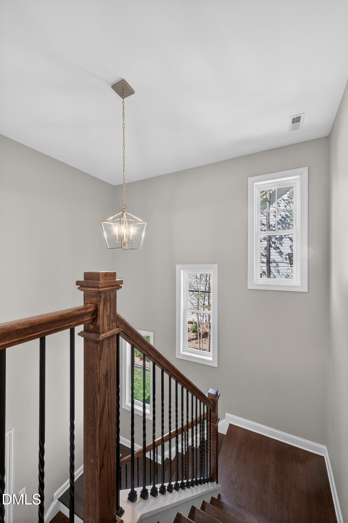231 High Ridge Lane Pittsboro, NC 27312 - Photo 28 of 47 a view of a hallway with windows and chandelier