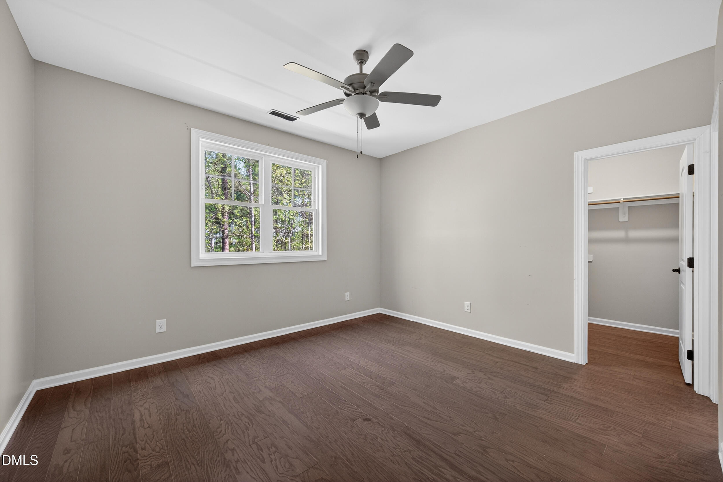 231 High Ridge Lane Pittsboro, NC 27312 - Photo 29 of 47 an empty room with wooden floor closet and windows