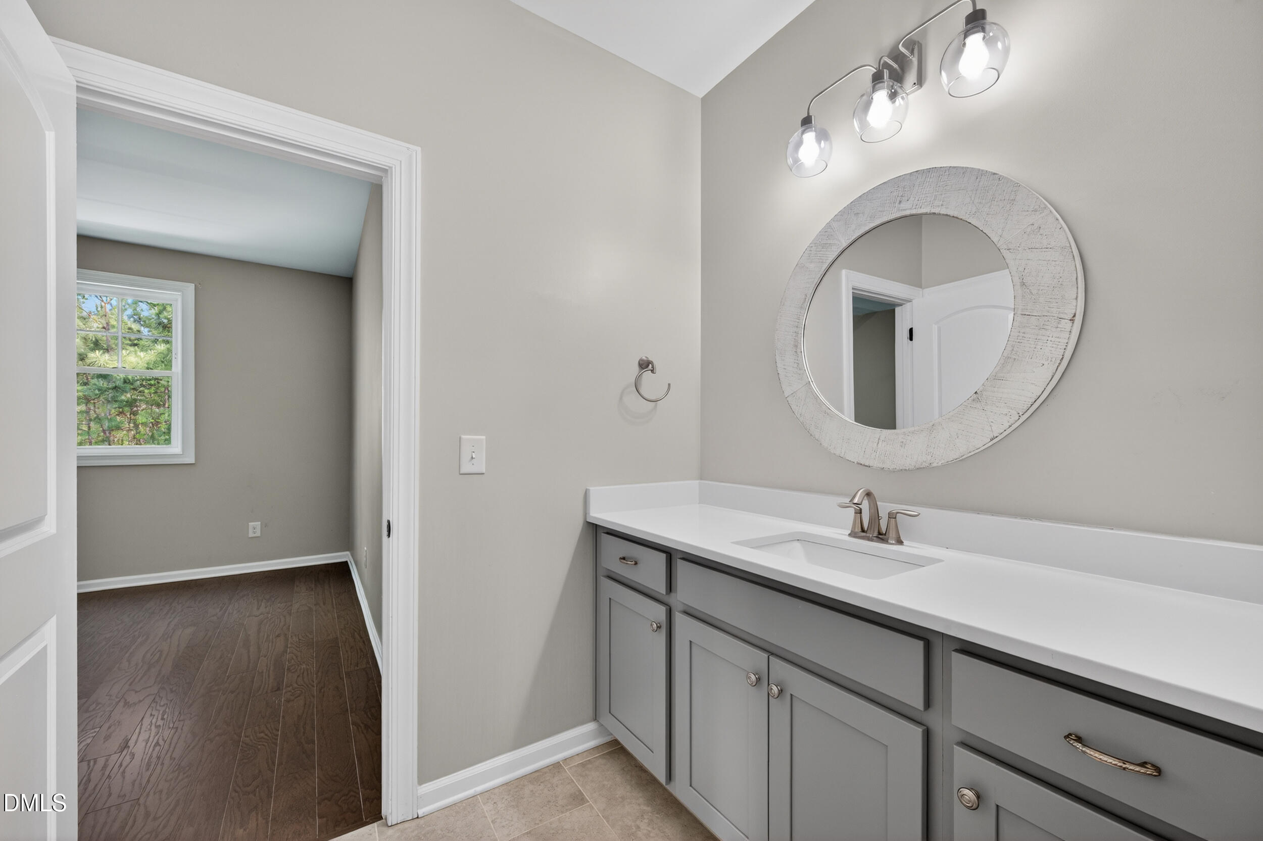 231 High Ridge Lane Pittsboro, NC 27312 - Photo 30 of 47 a bathroom with a sink and a mirror