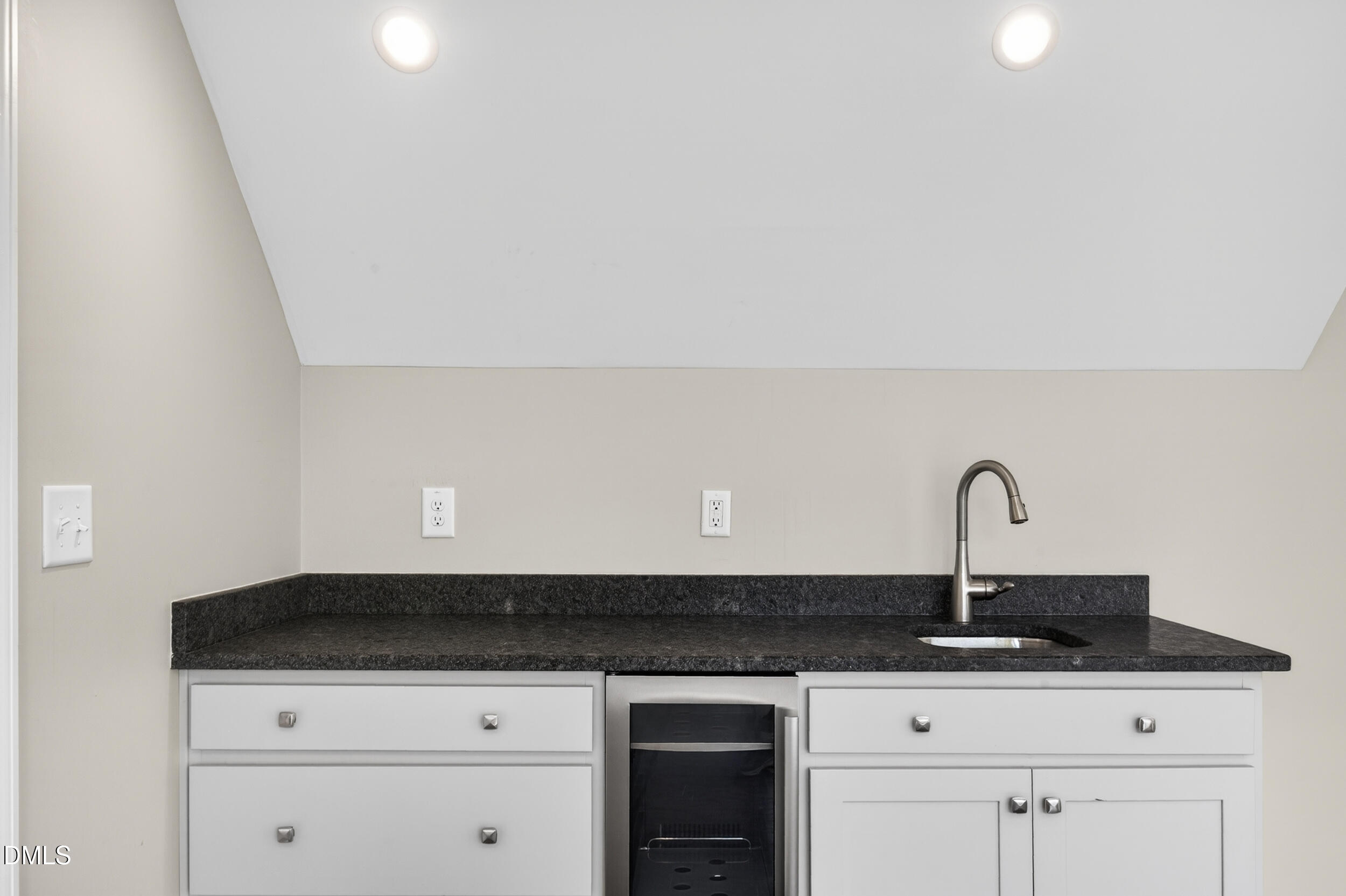 231 High Ridge Lane Pittsboro, NC 27312 - Photo 35 of 47 a close view of a sink a counter space and cabinets