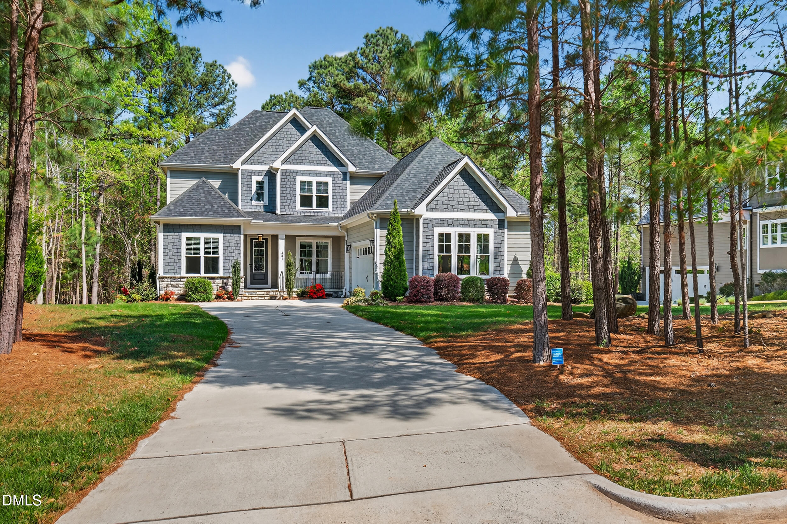 231 High Ridge Lane Pittsboro, NC 27312 - Photo 47 of 47 a front view of a house with a garden